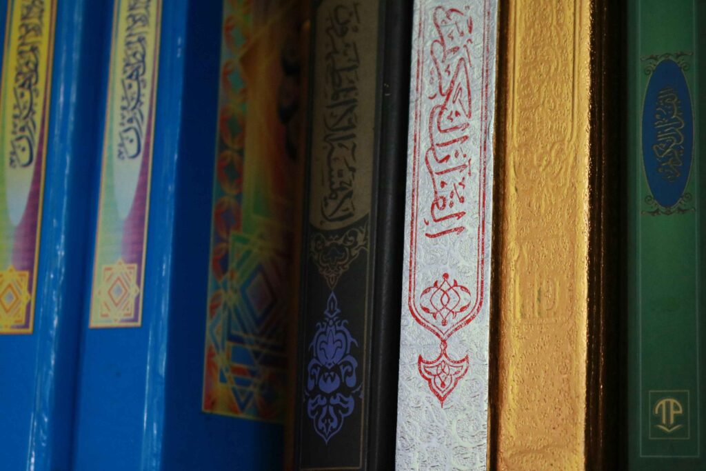 Some books are kept standing in library style